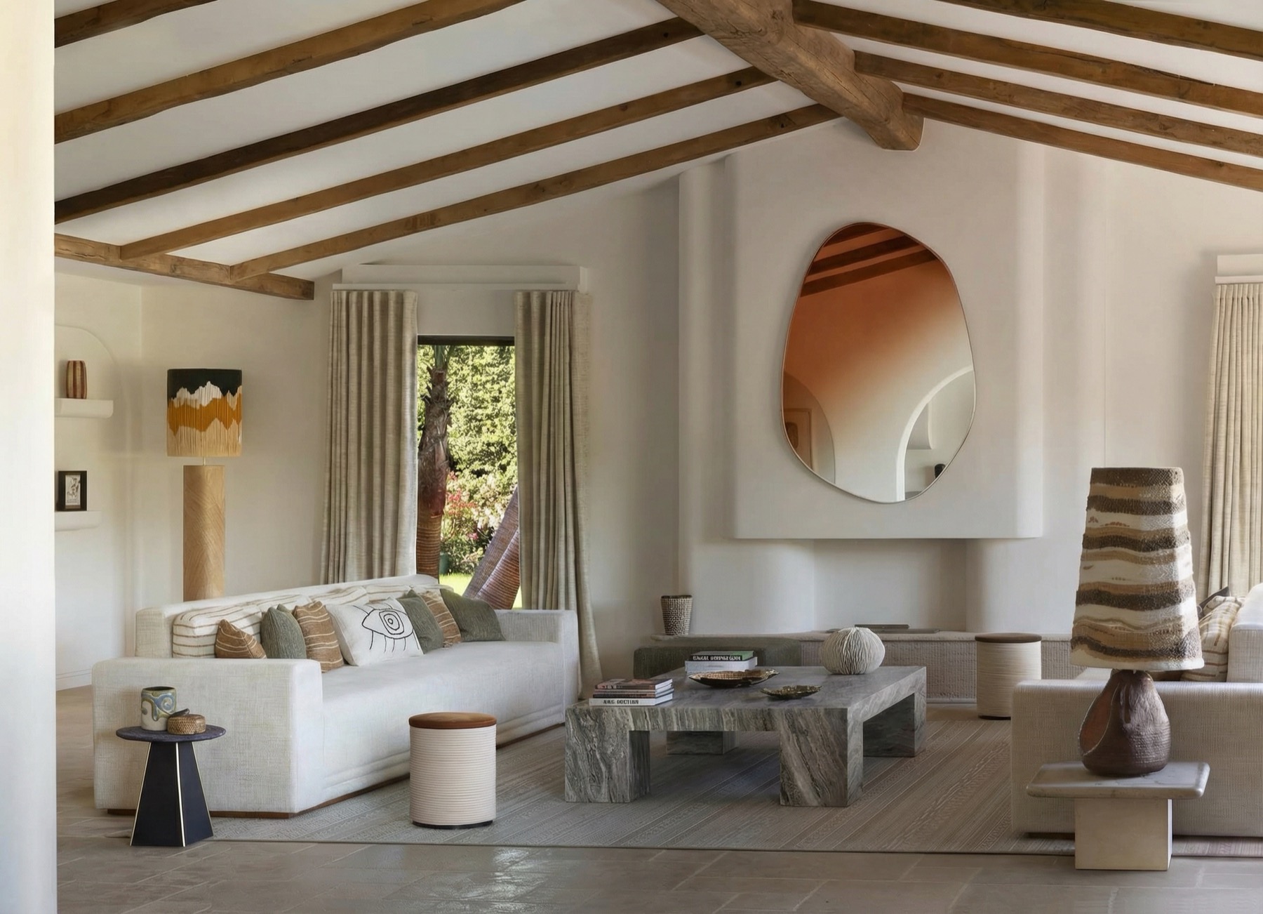 A round mirror with an orange gradient in a contemporary interior